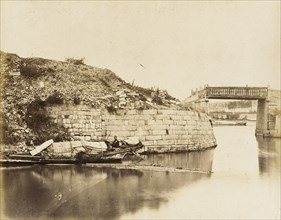 Walled River with Bridge and Houseboats, 1860. Creator: Felice Beato.