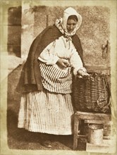 Aben Fishwife (Mrs. Flucker Of Newhaven, Shucking Oysters), Printed 1845. Creator: Hill & Adamson.