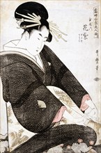The Courtesan Hanamurasaki of Tamaya from the series Supreme Beauties of the Present Day, 1794. Creator: Kitagawa Utamaro.