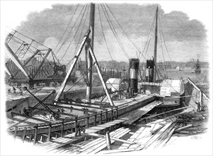 Laird's Graving Docks at Birkenhead: the Hibernia under repair, 1861. Creator: Unknown.