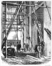 Progress of the Great Exhibition building: hoisting apparatus, 1861. Creator: Unknown.