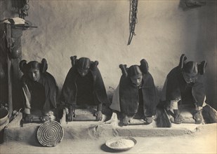 The mealing trough-Hopi, c1906. Creator: Edward Sheriff Curtis.