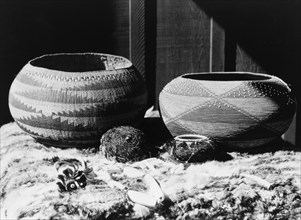 Pomo baskets and magnesite beads, 1924, c1924. Creator: Edward Sheriff Curtis.