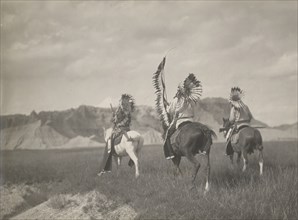A Sioux war party, 1905. Creator: Edward Sheriff Curtis.