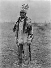 A Klamath in costume, c1923. Creator: Edward Sheriff Curtis.