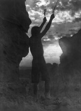 Offering to the sun-San Ildefonso, c1927. Creator: Edward Sheriff Curtis.