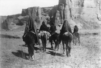 March through Tesacod Canyon, c1905. Creator: Edward Sheriff Curtis.
