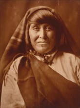 An Acoma woman, head-and-shoulders portrait, facing front, c1904. Creator: Edward Sheriff Curtis.