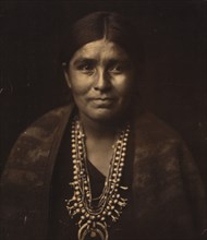 A Navaho woman, c1904. Creator: Edward Sheriff Curtis.