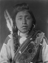 Kashhila-Wishham. Male Chinookan Indian, head-and-shoulders portrait, facing front..., c1910. Creator: Edward Sheriff Curtis.