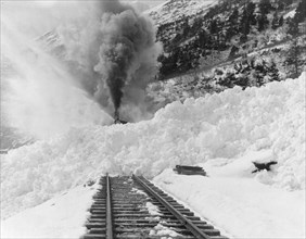 Avalanche of snow across railroad tracks, between 1890 and 1930. Creator: Frank G. Carpenter.
