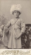 Portrait of a boy Leonid in a Caucasian national costume, end of 19th century. Creator: VV Degtiarev.