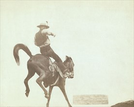Bucking Bronco Ned Coy, a famous Dakota cowboy, starts out for the cattle round-u..., 1888. Creator: John C. H. Grabill.