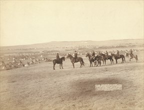 Gen Miles and staff viewing the largest hostile Indian Camp in the US, near Pine..., c1891. Creator: John C. H. Grabill.
