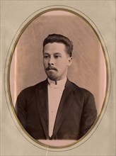 A young man in a civilian suit, late 19th cent - early 20th cent. Creator: PA Milevskii.