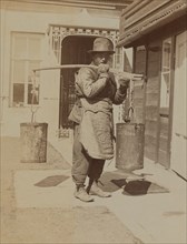 Dou Kee, one of the Chinese servants, carrying water buckets, Dom Smith, Vladivostok, Russia, 1899. Creator: Eleanor Lord Pray.