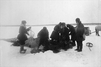 Ice fishing, 1890. Creator: Unknown.