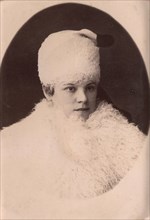 Young woman in winter clothes, late 19th cent - early 20th cent. Creator: Unknown.