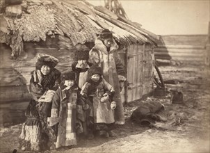 Group of Tartars [ie, Tatars] at small village near Minisinsk [ie, Minusinsk], between 1885 and 1886 Creator: Unknown.