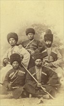 Group portrait of five men, seated, facing front, between 1870 and 1886. Creator: Unknown.