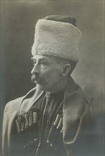 George Kennan wearing Georgian cossak uniform, half-length portrait..., between 1870 and 1886. Creator: Unknown.