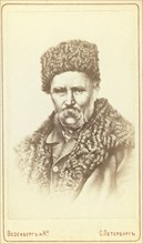 Taras Shevchenko, head-and-shoulders portrait, facing front, between 1880 and 1886. Creator: Unknown.
