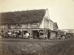 Market stalls beside old powder magazine, Irkutsk, between 1885 and 1886. Creator: Unknown.