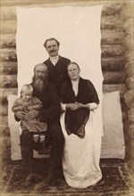Russian Traders in Uriankhai Territory. The Cossack S. F. Skobeev with Family (Son and Wife), 1897. Creator: Unknown.