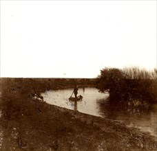 The Kherlen River - Soldiers in a boat, 1899. Creator: Unknown.