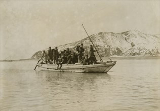 Squad of sappers and miners coming ashore in a sampan at Chemulpo, c1904. Creator: Robert Lee Dunn.