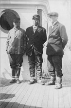 Eskimo boy in center who went with Mr. Lapp [i.e. Mr. William Thomas Lopp] on relief..., c1900-c1930 Creator: Unknown.