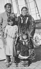 Eskimo family, between c1900 and c1930. Creator: Unknown.