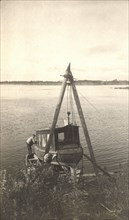 Repair of the boat "Mana" on the banks of the Zeya River, 1909. Creator: Vladimir Ivanovich Fedorov.