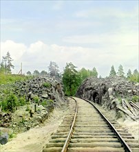Man standing beside railroad tracks, between 1905 and 1915. Creator: Sergey Mikhaylovich Prokudin-Gorsky.
