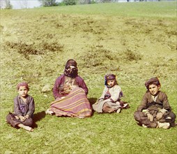 Kurd woman with children [Artvin], between 1905 and 1915. Creator: Sergey Mikhaylovich Prokudin-Gorsky.