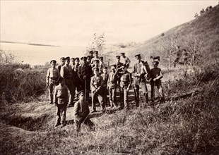 A group of Irkutsk high school students with a teacher on the bank of the river (Ushakovka), 1900. Creators: I. A. Podgorbunskii, V. I. Podgorbunskii.