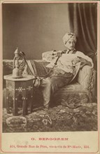 Marquis Claes Lagergren (1853-1930) in eastern costume smoking a hookah. Creator: Guillaume Berggren.
