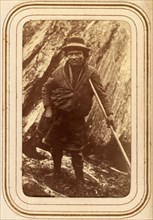 Sami man with a stick, 1868. . Creator: Lotten von Duben.