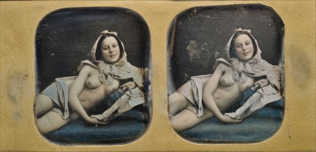 Young scantily clad woman, lying on her side.  Creator: Unknown.