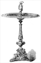 Silver repoussé table manufactured by...Elkington and Co., in the International Exhibition, 1862.  Creator: Unknown.