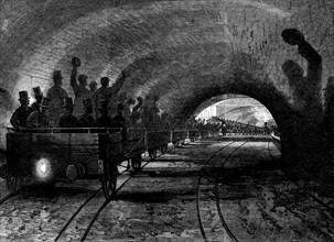 Trial-trip on the Metropolitan (underground) Railway: the train passing Portland-road station, 1862. Creator: Unknown.