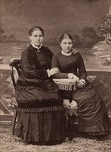 Paired photo portrait of Mamomnovs Mamakra Avdeevna and daughter Ekaterina Yakovlevna, 1890. Creator: Unknown.