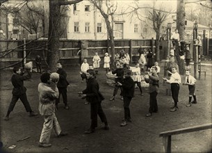 Moscow: Jewish orphanage named after the Comintern. Games in the garden, 1920-1929. Creator: Unknown.