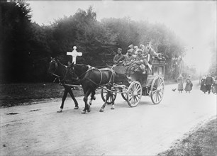 Red Cross Transport in Forest of Laigle (i.e., Laigne), 1914. Creator: Bain News Service.