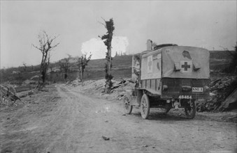 American Ambulance on road to Verdun, shell bursting, between c1915 and 1918. Creator: Bain News Service.