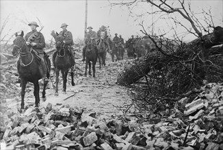 British Cavalry passing thro' wrecked village, 21 Apr 1917.. Creator: Bain News Service.
