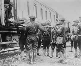 American soldiers & wounded, 27 Apr 1918. Creator: Bain News Service.