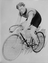 New Zealand cyclist, Fred Jumbo Wells on bike, between c1910 and c1915. Creator: Bain News Service.
