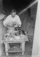 Syrian shoemaker, 1916. Creator: Bain News Service.