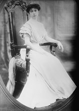 Mrs. L.V. Harcourt, cameo portrait, sitting, 1912. Creator: Bain News Service.